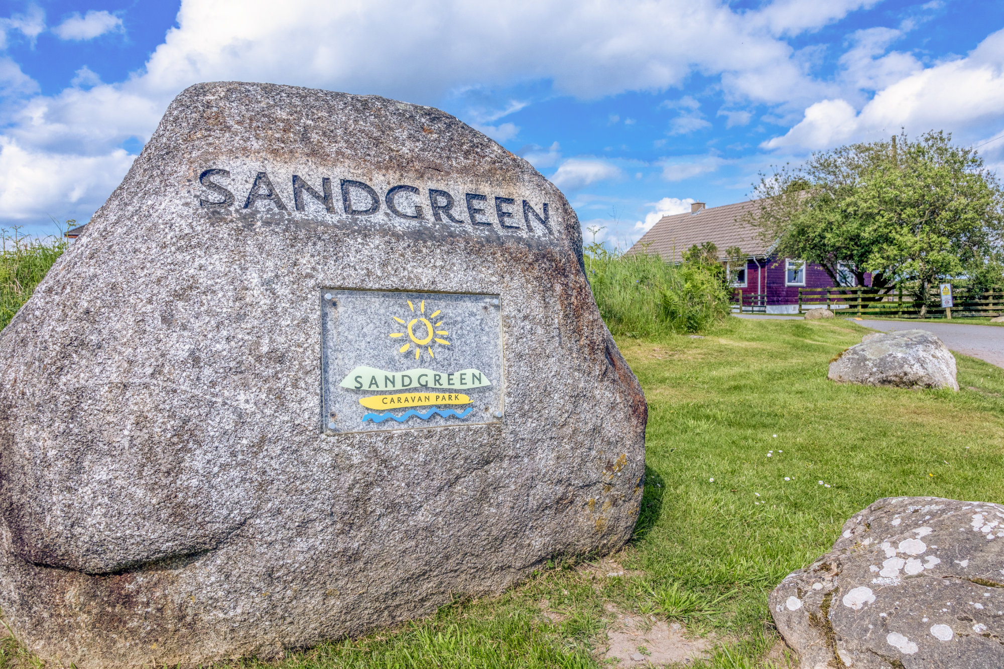 Sandgreen boulder at entrance to Sandgreen Caravan Park
