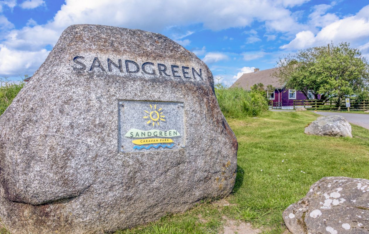 Sandgreen boulder at entrance to Sandgreen Caravan Park
