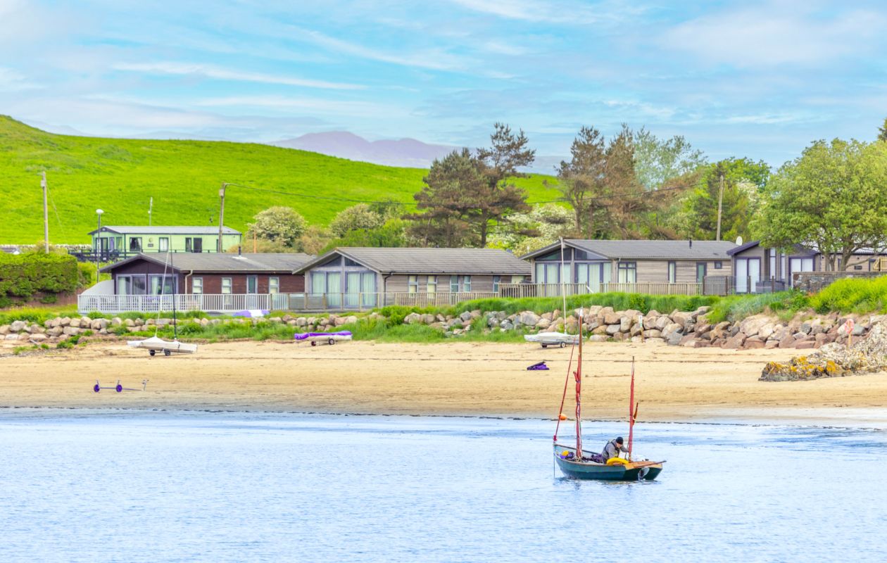 Holiday homes on the beach at Sandgreen Caravan Park