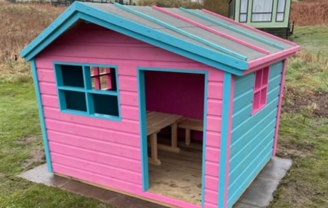 Wendy house in the play park at Sandgreen Caravan Park